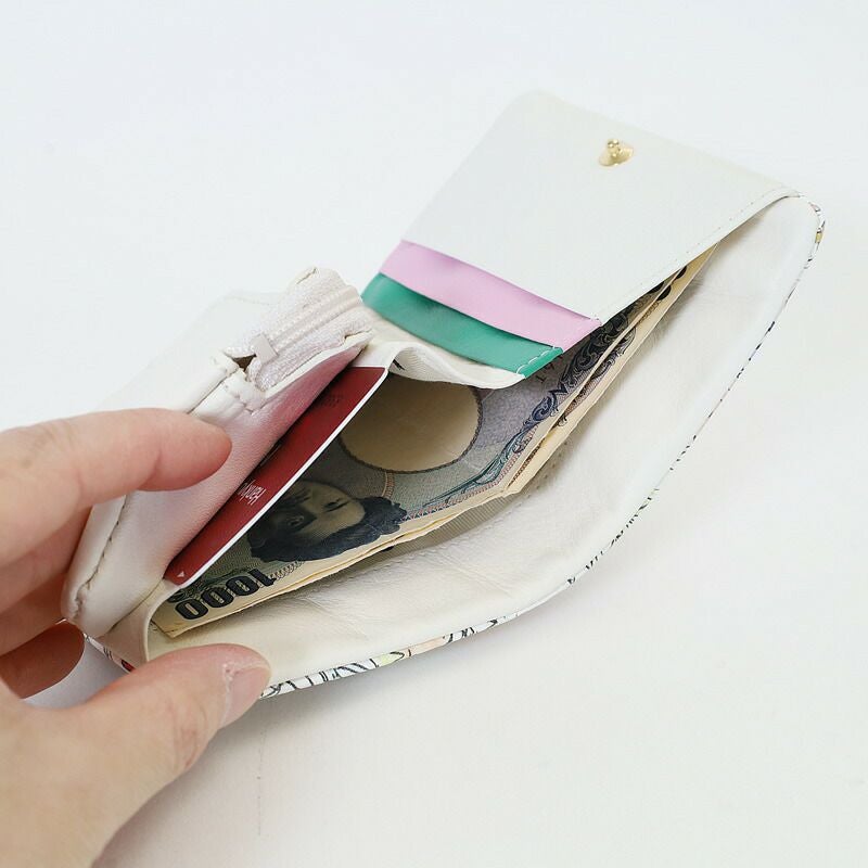 tsumori chisato CARRY ナチュラルラブ 二つ折り財布 | TOZAI NANBOKUYA