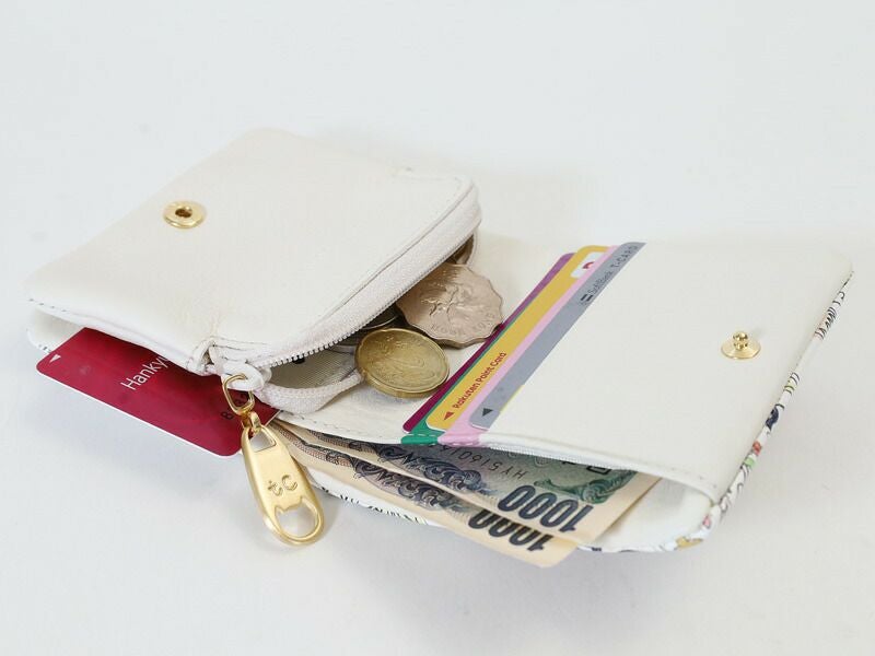 tsumori chisato CARRY ナチュラルラブ 二つ折り財布 | TOZAI NANBOKUYA