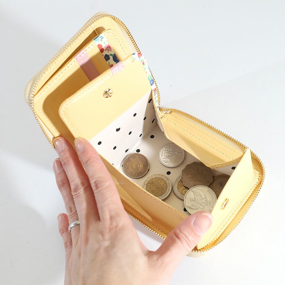 tsumori chisato CARRY エポネコメッシュ 二つ折り財布 | TOZAI NANBOKUYA